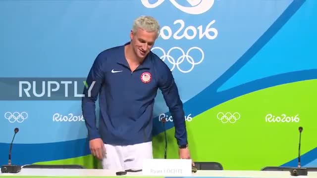 Ryan Lochte speaks to press after sinking in 200m medley