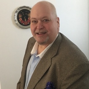 John G. Manjounes