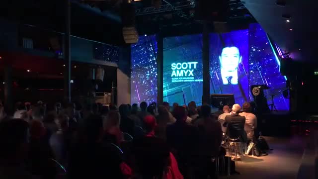 Scott Amyx speaking in Prague.